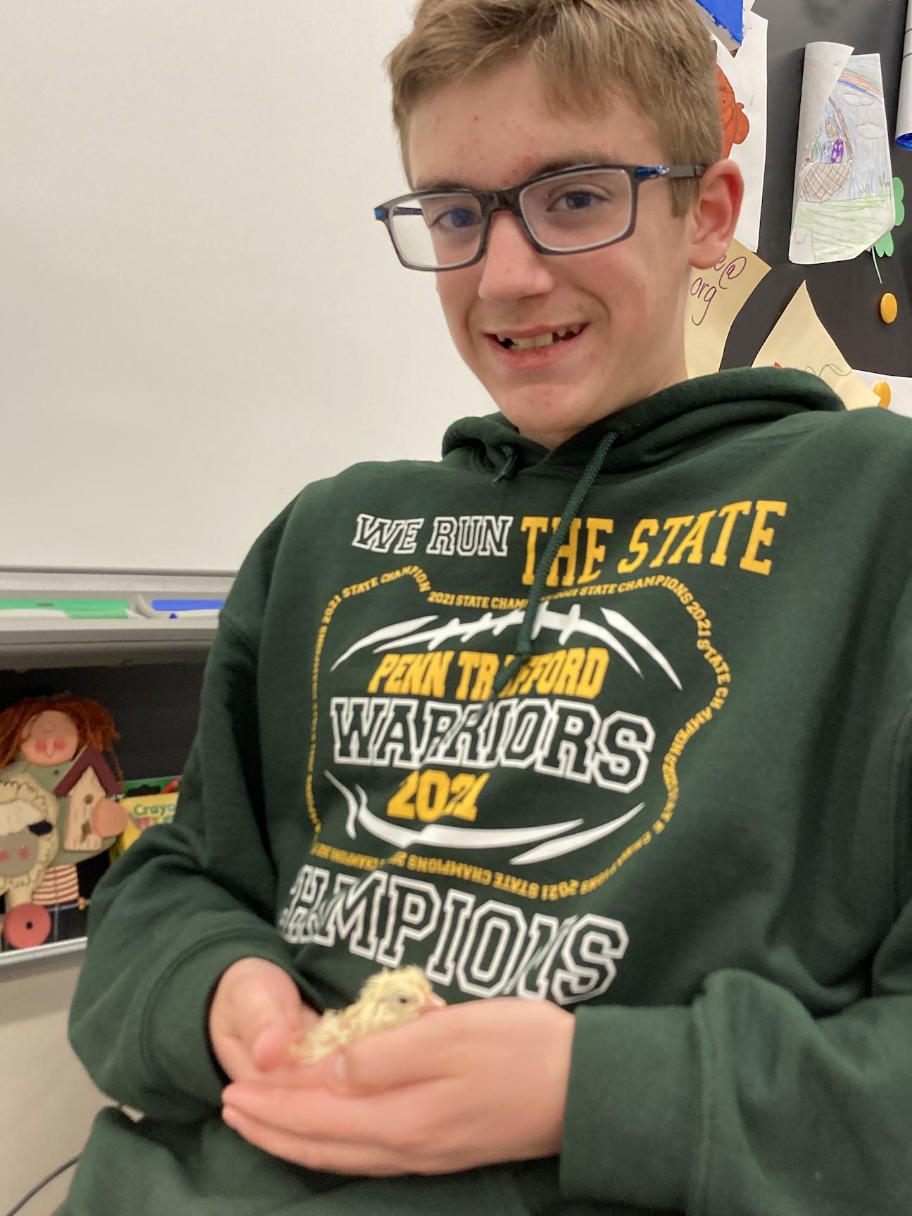 Anthony Stagno (grade 8) stops by to visit his mom’s classroom and see the baby chicks