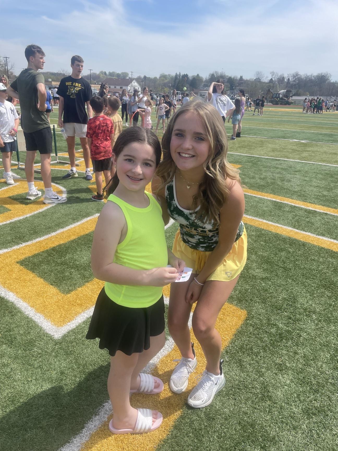 Sophia Colecchi (Level Green) and her big buddy, Brynlee Echard