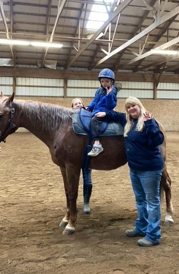 2nd-grader Jackson Styslinger enjoys a horseback ride