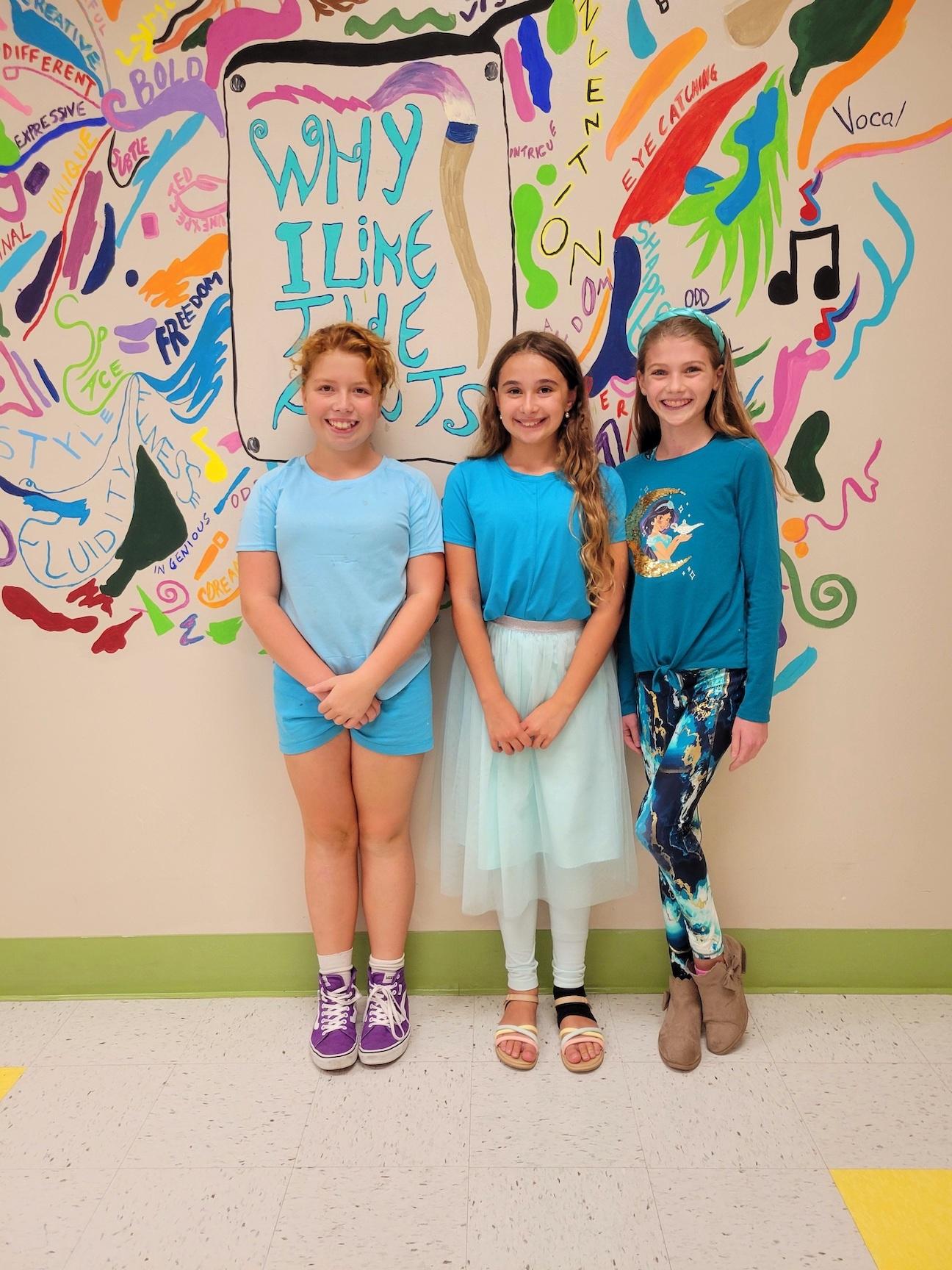 Penn Middle School students  Eliana Zummo, Remmy Meier, and Juliana Kepple wore Teal in remembrance of Mrs. Landram who passed away in 2022 